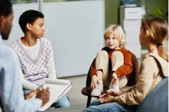 Child psychologist working with a small group